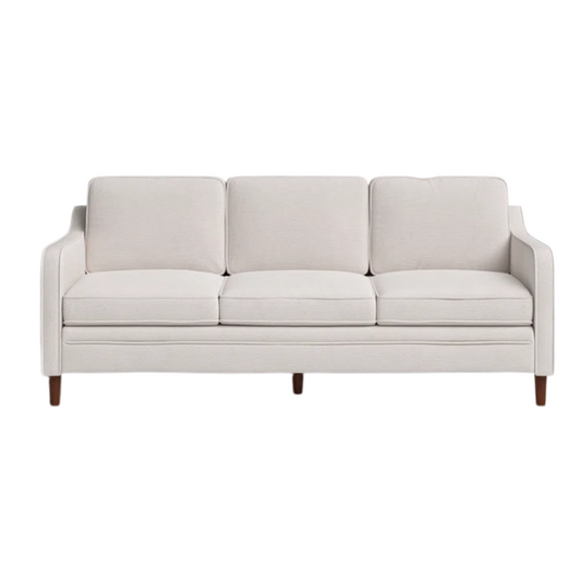 Light grey chenille upholstered sofa with curved track arms, foam-filled cushions, and brown tapered wood legs in a modern mid-century design.