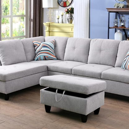 Light grey L-shaped sectional sofa with right-facing chaise and ottoman, microfiber upholstery and light gray wooden legs
