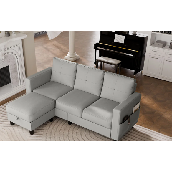 Compact light grey L-shaped sectional sofa with storage ottoman, firm cushions, and stain-resistant fabric, perfect for small spaces.

