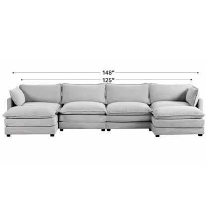 Light grey modular 4-seat sectional sofa with two matching ottomans, upholstered in soft corduroy fabric with high-resilience cushions and a durable wood and metal frame.