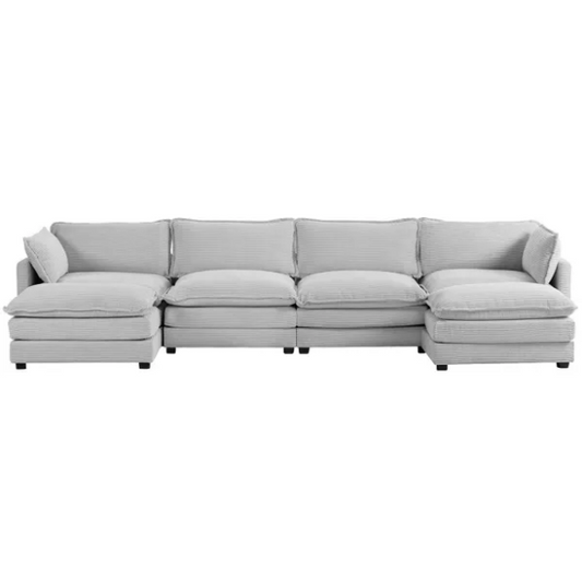 Light grey modular 4-seat sectional sofa with two matching ottomans, upholstered in soft corduroy fabric with high-resilience cushions and a durable wood and metal frame.