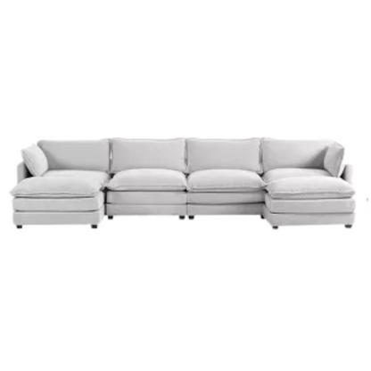 Light grey modular 4-seat sectional sofa with two matching ottomans, upholstered in soft corduroy fabric with high-resilience cushions and a durable wood and metal frame.
