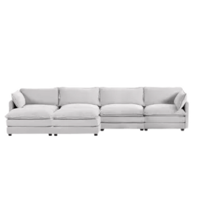 Light grey modular 4-seat sectional sofa with two matching ottomans, upholstered in soft corduroy fabric with high-resilience cushions and a durable wood and metal frame.