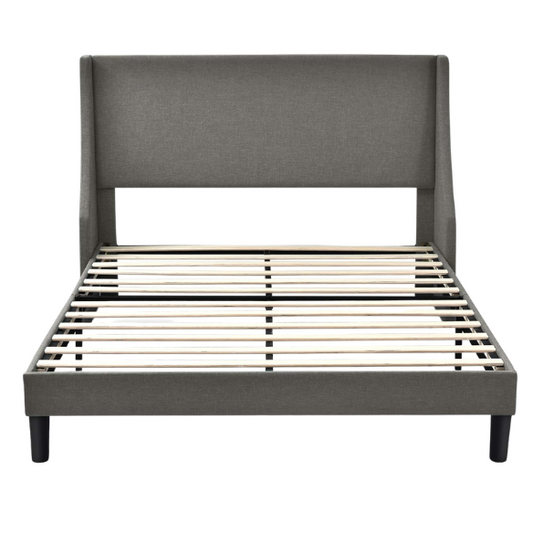 Light grey linen upholstered queen platform bed with wingback headboard, tapered black legs, and slatted support – no box spring needed

