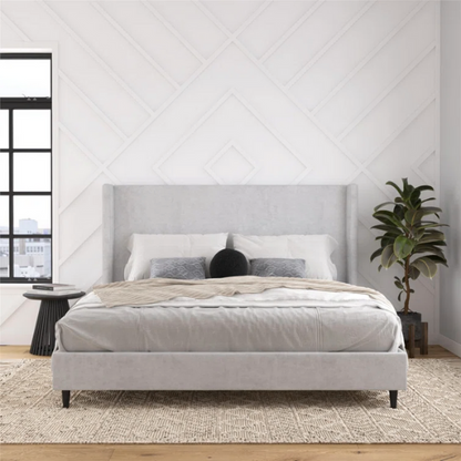 Light grey upholstered king platform bed with tall wingback headboard in soft woven fabric, no box spring required