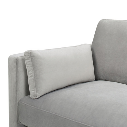 Light grey velvet 3-seater sofa with feather-down cushions, track arms, and natural wood legs, designed for modern and transitional spaces.

