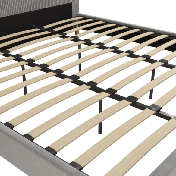 Light grey velvet king-size platform bed with upholstered headboard and wood slats, modern design, no box spring required.

