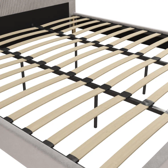Light grey velvet king-size platform bed with upholstered headboard and wood slats, modern design, no box spring required.

