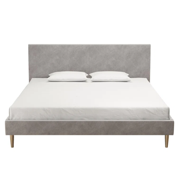 Light grey velvet king-size platform bed with upholstered headboard and wood slats, modern design, no box spring required.

