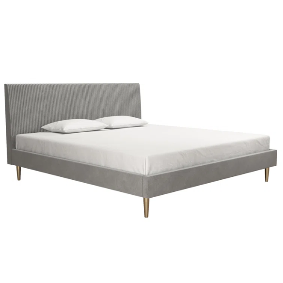 Light grey velvet king-size platform bed with upholstered headboard and wood slats, modern design, no box spring required.

