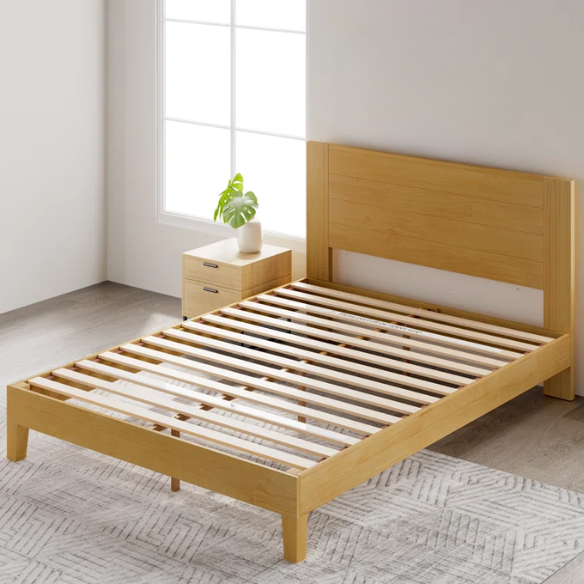 Light natural wood queen platform bed with slatted base and rectangular headboard, made from solid pine with metal center support legs