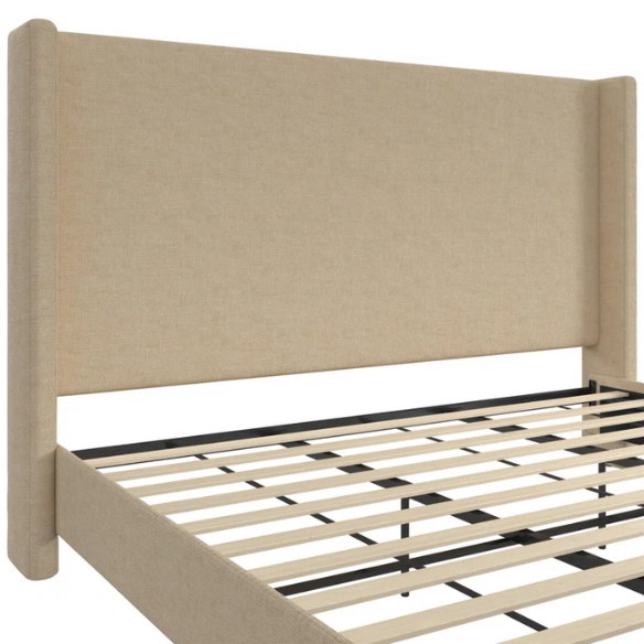 Light tan canvas upholstered king platform bed with tall wingback headboard, no box spring required