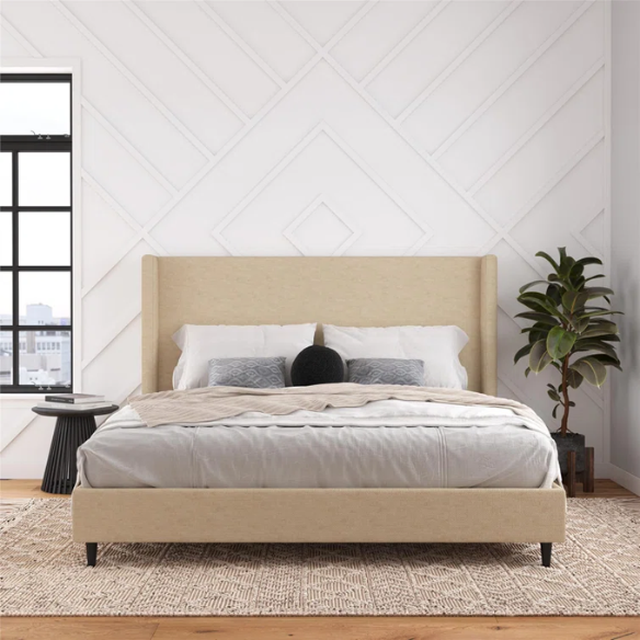 Light tan canvas upholstered king platform bed with tall wingback headboard, no box spring required