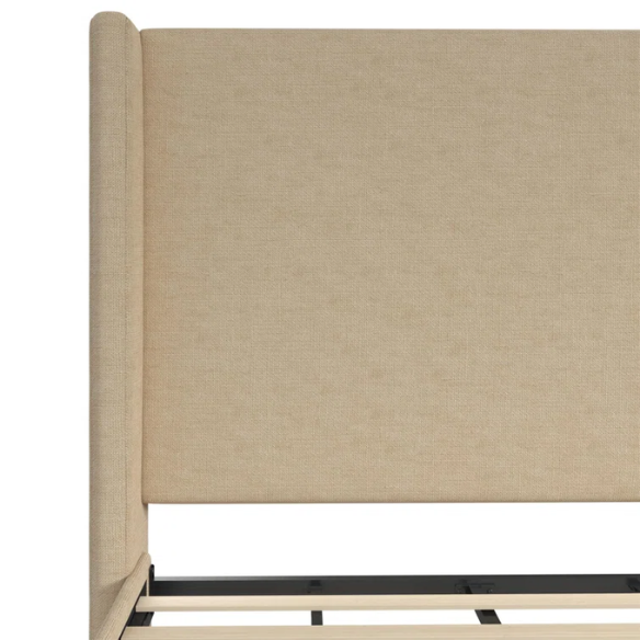 Light tan canvas upholstered king platform bed with tall wingback headboard, no box spring required