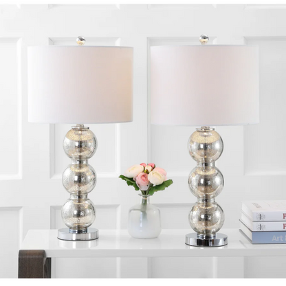 Set of 2 mercury glass table lamps with triple-sphere design, polished silver accents, and white linen drum shade – elegant lighting for modern or glam interiors

