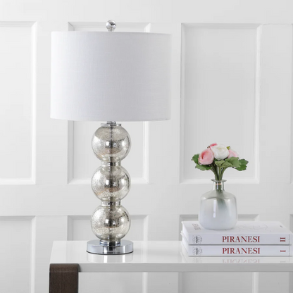 Set of 2 mercury glass table lamps with triple-sphere design, polished silver accents, and white linen drum shade – elegant lighting for modern or glam interiors

