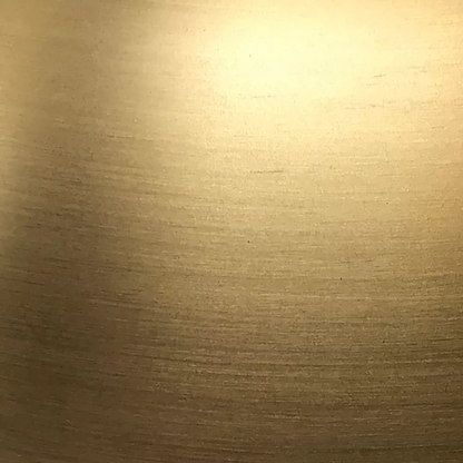 Mid-century modern brass table lamp with a white drum fabric shade and rotary switch, ideal for living rooms, bedrooms, or office desks

