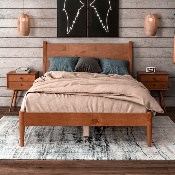 Mid-century modern full-size solid wood platform bed in medium light brown with rectangular headboard and tapered legs