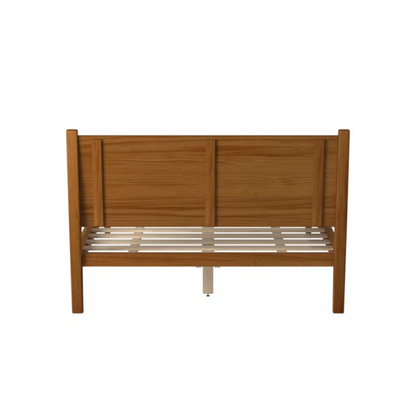 Mid-century modern full-size solid wood platform bed in medium light brown with rectangular headboard and tapered legs