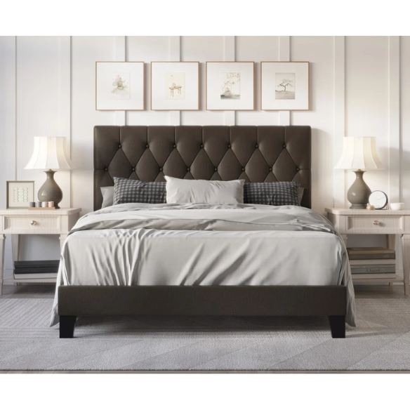 Mocha brown full size upholstered platform bed with button-tufted faux leather headboard, solid wood slats, and center support legs.