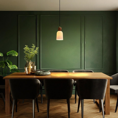 Modern adjustable black pendant light with white ceramic shade, ideal for dining room and kitchen island.