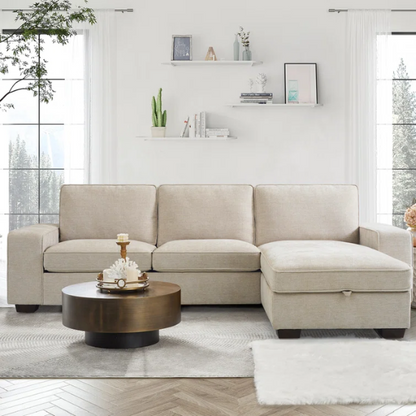 Modern beige chenille sofa with reversible cushions, built-in USB charging port, under-seat storage, and included ottoman and accent pillows.

