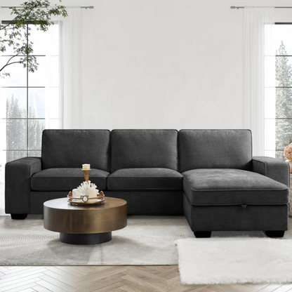 Modern black chenille upholstered sofa with reversible cushions, built-in USB charging port, under-seat storage, and matching ottoman and toss pillows.

