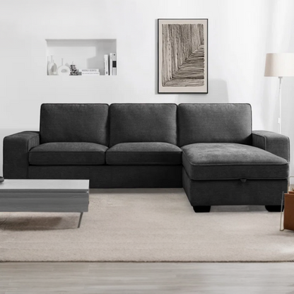 Modern black chenille upholstered sofa with reversible cushions, built-in USB charging port, under-seat storage, and matching ottoman and toss pillows.

