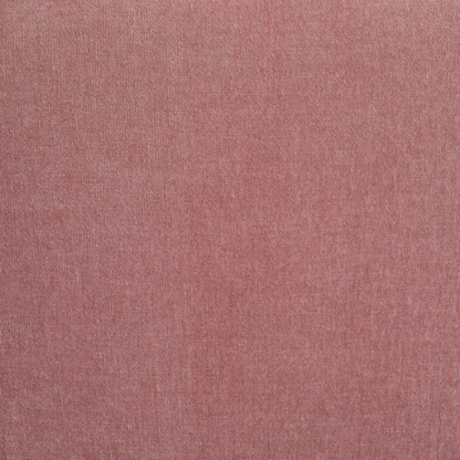 Modern dusty rose upholstered sofa with deep seating and chrome-finished legs, featuring four matching accent pillows—ideal for soft, stylish living spaces.