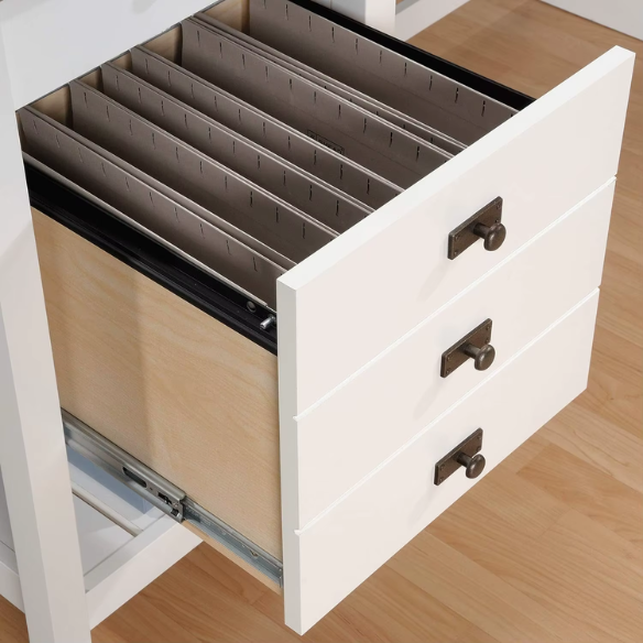 Modern farmhouse L-shaped executive desk in soft white with Lintel Oak accents, featuring spacious work surface and practical storage.