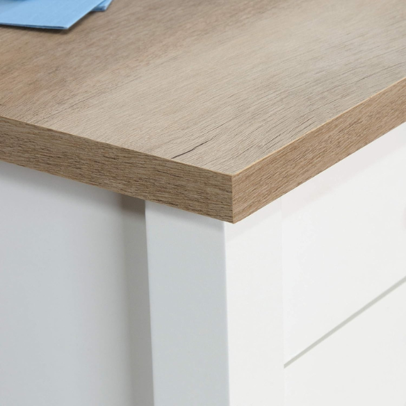 Modern farmhouse L-shaped executive desk in soft white with Lintel Oak accents, featuring spacious work surface and practical storage.