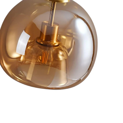 Modern minimalist glass ball chandelier with matte retro base for stylish home lighting.