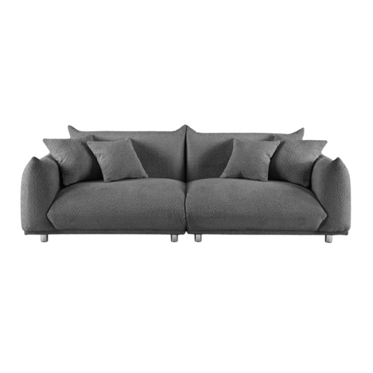 Modern 88.9-inch grey upholstered sofa with deep seat, rounded arms, chrome legs, and four matching accent pillows – ideal for contemporary living rooms or apartments.

