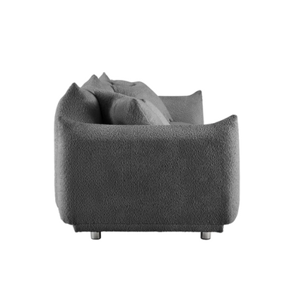 Modern 88.9-inch grey upholstered sofa with deep seat, rounded arms, chrome legs, and four matching accent pillows – ideal for contemporary living rooms or apartments.

