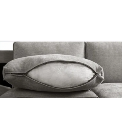 Modern light grey chenille upholstered sofa with reversible cushions, under-seat storage, built-in USB charging port, and matching ottoman and accent pillows.

