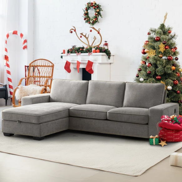 Modern light grey chenille upholstered sofa with reversible cushions, under-seat storage, built-in USB charging port, and matching ottoman and accent pillows.

