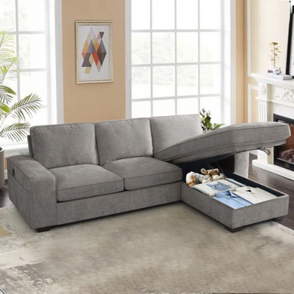 Modern light grey chenille upholstered sofa with reversible cushions, under-seat storage, built-in USB charging port, and matching ottoman and accent pillows.

