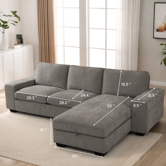Modern light grey chenille upholstered sofa with reversible cushions, under-seat storage, built-in USB charging port, and matching ottoman and accent pillows.

