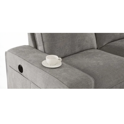 Modern light grey chenille upholstered sofa with reversible cushions, under-seat storage, built-in USB charging port, and matching ottoman and accent pillows.

