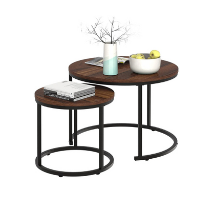 Modern round nesting coffee tables with brown wood top and black metal legs