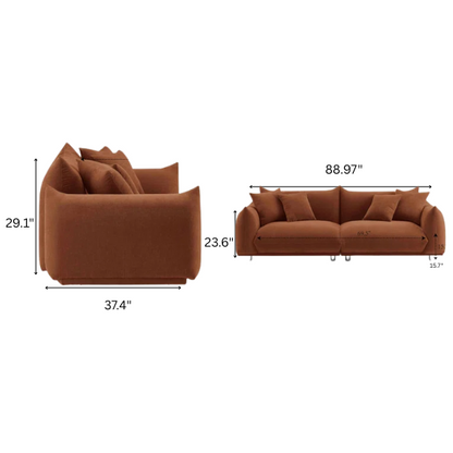 Modern rust upholstered sofa with deep seating and chrome-finished legs, featuring 4 matching accent pillows, perfect for contemporary living rooms.