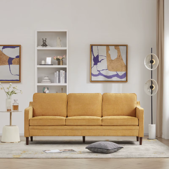 Mustard yellow chenille upholstered sofa featuring curved track arms, mid-century tapered wood legs, and supportive foam cushions in a bold modern design.