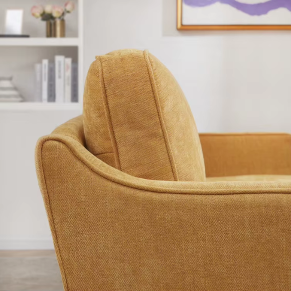Mustard yellow chenille upholstered sofa featuring curved track arms, mid-century tapered wood legs, and supportive foam cushions in a bold modern design.