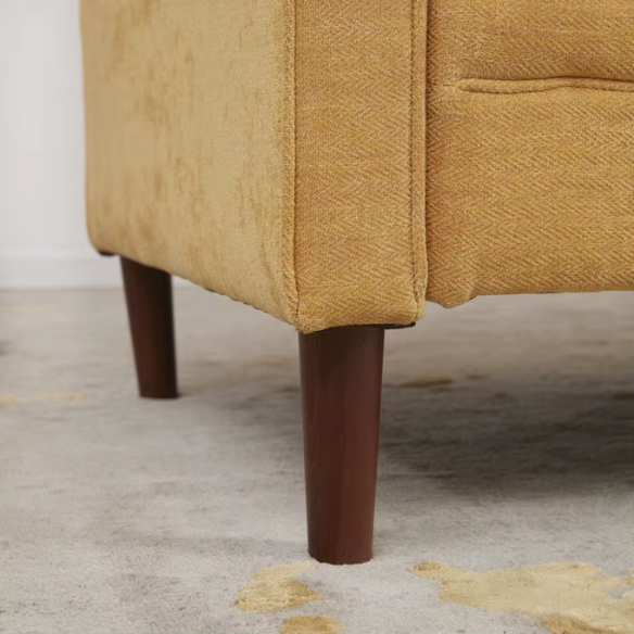 Mustard yellow chenille upholstered sofa featuring curved track arms, mid-century tapered wood legs, and supportive foam cushions in a bold modern design.