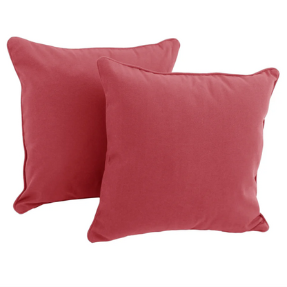 Set of two muted red square throw pillows with corded edges and hidden zipper, perfect for modern or transitional indoor décor

