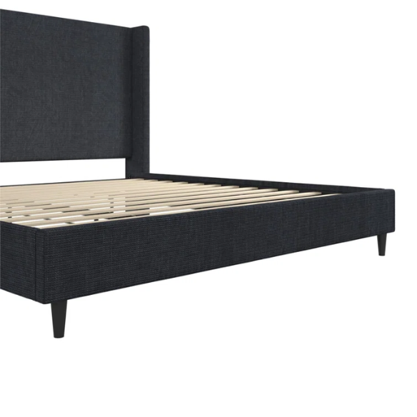 Navy blue canvas upholstered king platform bed with tall wingback headboard, no box spring required