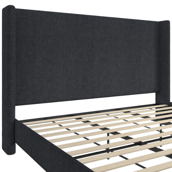 Navy blue canvas upholstered king platform bed with tall wingback headboard, no box spring required