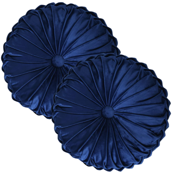 Navy blue velvet round throw pillows with hand-sewn pleats and button center, 14.5-inch set of two styled on a neutral-toned sofa.

