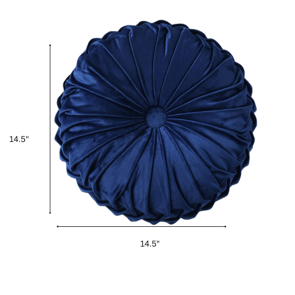 Navy blue velvet round throw pillows with hand-sewn pleats and button center, 14.5-inch set of two styled on a neutral-toned sofa.

