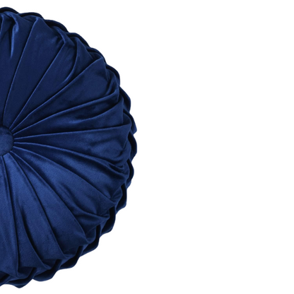 Navy blue velvet round throw pillows with hand-sewn pleats and button center, 14.5-inch set of two styled on a neutral-toned sofa.

